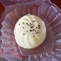 Bao bun filled with savory protein at Loving Hut - Mira Mesa in San Diego