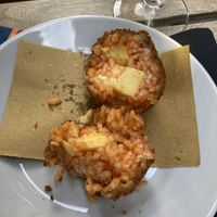 Supplí - fried rice balls with vegan cheese inside. Very delicious but a bit expensive (6€ + 2,50€ for service)  at Urbana 47 in Rome