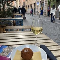 Good wine and very nice place to sit. Street with very nice and individual shops. Not too busy.   at Urbana 47 in Rome