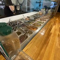 Options to choose from at Kalma Poké Bar in Bilbao