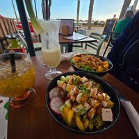 Vegan tofu poke bowl, heura bowl, caipirinha, and pinha colada at Ohana Poke & Ice Cream in Mallorca