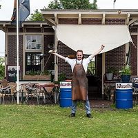 The owner at IJsselhuis Museumhavencafe in Gouda