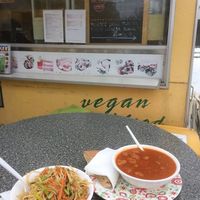 Goulash and chow main noodles at Loving Hut Express in Ljubljana