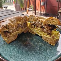 Egg, Bacon & Cheese on Jalapeño Bagel:
Scrambled tofu, special sauce, smokey tempeh, mozzarella and cheddar cheese. at Ahimsa Sanctuary in Central Singapore