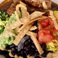 Yucatan Mayan bowl - delicious tofu, rice, beans, and kale covered in a mole sauce.  at Plant Junkie - Vanderbilt in New York City