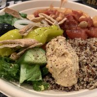 Moroccan Mirage bowl - Quinoa, chickpeas, coconut kale, hummus, olives, tofu feta, and more! at Plant Junkie - Vanderbilt in New York City