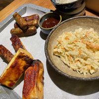 Coleslaw, grilled tempeh, tofu, sausage at OhniskO Fire Dining & Brew Bar in Kosice