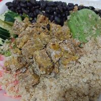 Buddha bowl take away (tomato and lettuce underneath)  at Sanu in Ibarra