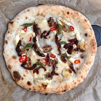 Valerio! Garlic may, basil, sun dried tomatoes, chilli, walnut, homemade cashew mossarella at Bakgården in Karlstad