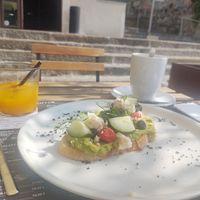 Vegan bread with fresh orange juice and Oat milk cacao at EK Bistro in Ljubljana