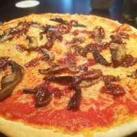 Funghi vegan pizza with caramelised onions at Little Wing Pizzeria - Lisburn Rd in Belfast