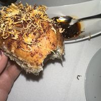 Bread topped with saffron.  So good   at Elizabeth's in Washington