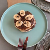 Plant-based/vegan hazelnut chocolate pancakes with banana for breakfast at Mod Santorini in Santorini