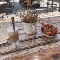 Vegan oat latte and sweet potato chips  at Ao Largo in Odeceixe