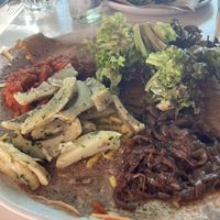 Vegan crêpes with artichokes, some kind of pickled or caramelised onions and a really delicious tomato paste  at Pti Breizh in Hamburg