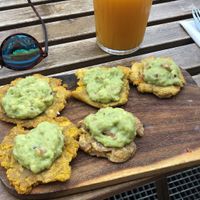 Vegan (custom) tostones with a mango michelada  at LUCHA LIBRE in Lausanne