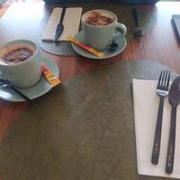 Table anda capuchino at Green Point in Aveiro