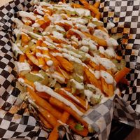 Buffalo fries with ranch and celery on top! Amazing at FRANCIS in Minneapolis