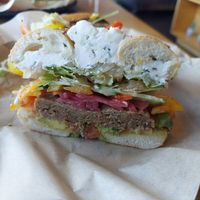 Vegan Very Veggie (Signature Sando) with added vegan sausage at Seize The Bagel - Cascade Park in Vancouver
