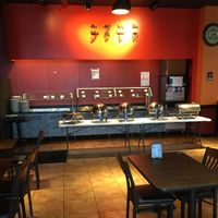 Buffet and dining area at The Hyderabad Indian Grill in Bloomington