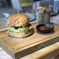 Vegan Burger with Potato Wedges  at Flavors Cafe in Doha