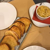 Garlic bread and chickpea dip   at Fangas Veg in Coimbra