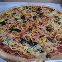 Large Pizza with VioLife cheese, spinach, and pepperoncini peppers at Pizza Academy in Exeter