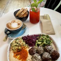 Heppy Vegan plate with raspberry/basil lemonade and an oat milk cappuccino   at Heppy Green in Frankfurt