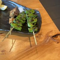 Shishito peppers and half eaten trumpet mushrooms   at Izakaya Gama in Point Arena