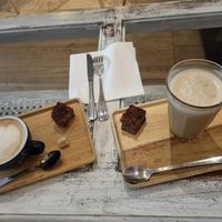 Cappuccino and iced latte with free little cake at Kottee Kaffee in Bruges