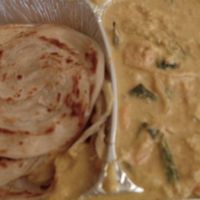 Parotta Veg Korma: south Indean fluffy bread with very creamy curry (had carrots, cauliflower,…)  at Goa India in Gottingen