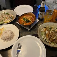 Red curry, rice noodles, and fried rice, plus Singha beer at Krua Siam in Akureyri