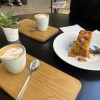 Cortado with Oat milk and pumpkin cake  at Arvo Specialty Coffee (Guggenheim) in Bilbao