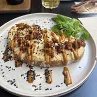 Toast with hummus  at Arvo Specialty Coffee (Guggenheim) in Bilbao