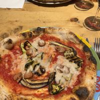 pizza with vegan cheese and vegan sausages  at Rossopomodoro - Milano Centrale in Milan