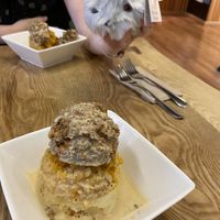 Vegan Haggis with a Wild Hairy Haggis in the rear   at The Haggis Box in Edinburgh