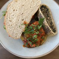 Squeaky bean sandwich, sausage roll, jacket potato  at The Bruce Arms in Ripon