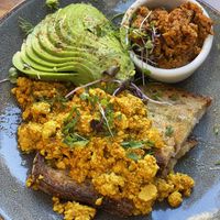 tofu scramble on sourdough toast with avocado and vegan chorizo  at Caravelle in Barcelona