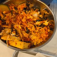 Spicy tofu bibimbap bowl with kimchi at Rice Bar - Capitol Gallery in Washington