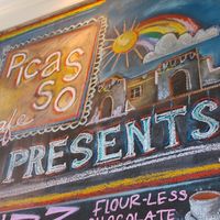 Happy greeter reader board shared vegan options at Picasso Cafe on Paseo in Oklahoma City