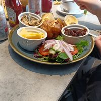 Jacket potato with garlic mushrooms, caramelised onion chutney, vegan cheese and vegan butter at Pucelli's in Padstow