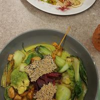 Dish with tempeh and potatoes and the "Bali bowl" at Verde in Karlsruhe
