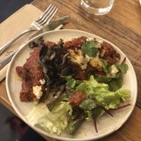 Chilaquiles (vegan option : vegan feta and mushrooms)  at La Main Noire  in Paris