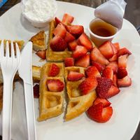 waffle with strawberries and coconut cream at Pure Vegan Cafe in Raleigh