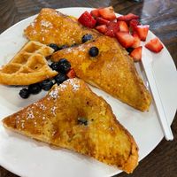french toast with blueberries and strawberries at Pure Vegan Cafe in Raleigh
