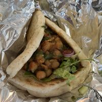 Delicious Chana masala wrap, with nice kick! (Little spicy)  at Pure Vegan Cafe in Raleigh