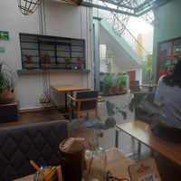 Outdoor seating area at Santa Hierba Centro in Oaxaca