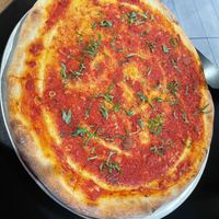 Large vegan pie with just tomato and basil and garlic   at Alfie's in Rocky Point