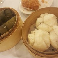 Steamed char siu bao and glutinous rice in lotus leaves. at Po Kong Vegetarian Restaurant in Vancouver
