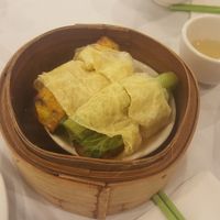 Vegetables wrapped in tofu skin. Hard to eat with chopsticks since they didn't cut the vegetable filling all the way through. at Po Kong Vegetarian Restaurant in Vancouver